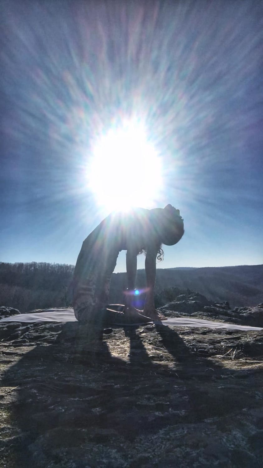 [COMP] I was recording my outdoor practice and camel pose lined up perfectly with the sun. Heart open and receiving solar energy