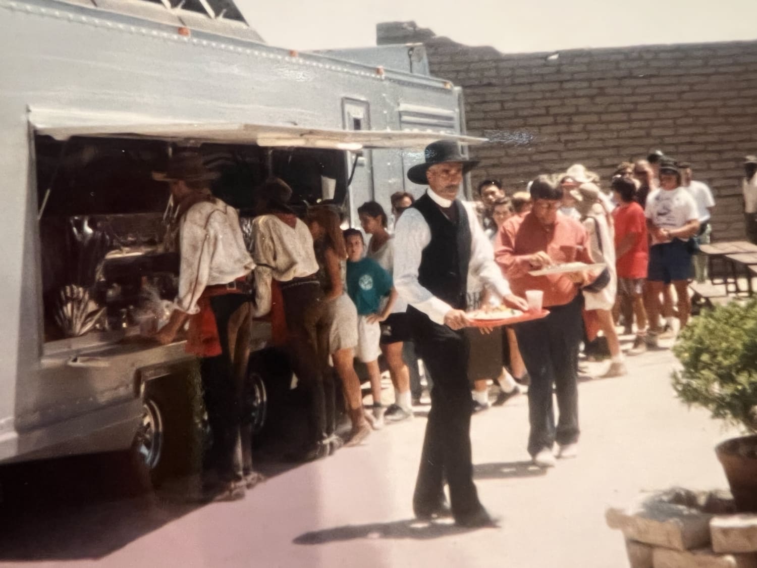 Sam Elliott getting lunch from a food truck on the set of Tombstone in Old Tucson (1993)