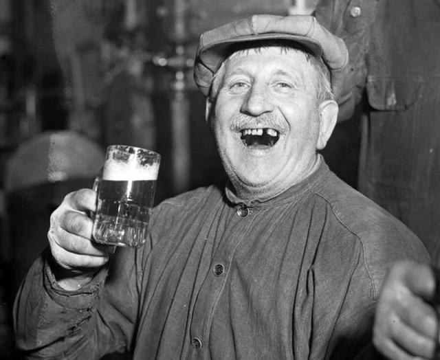 . F. Kaufman of Jake Ruppert's Brewery on the Upper East Side raises his first legal glass in 15 years when Prohibition ends in December 1933.