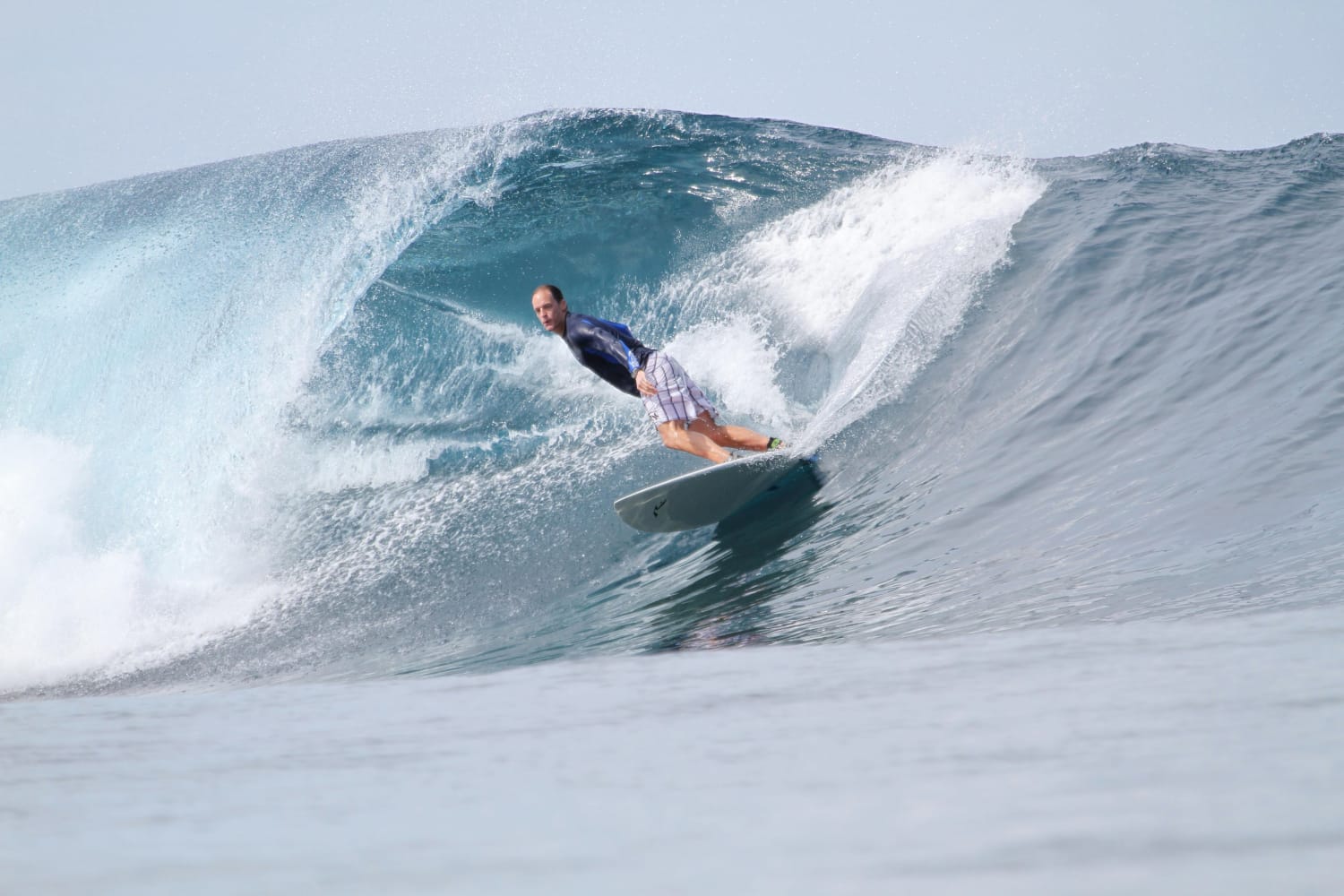 found this pic of my dad surfing this gem in indonesia
