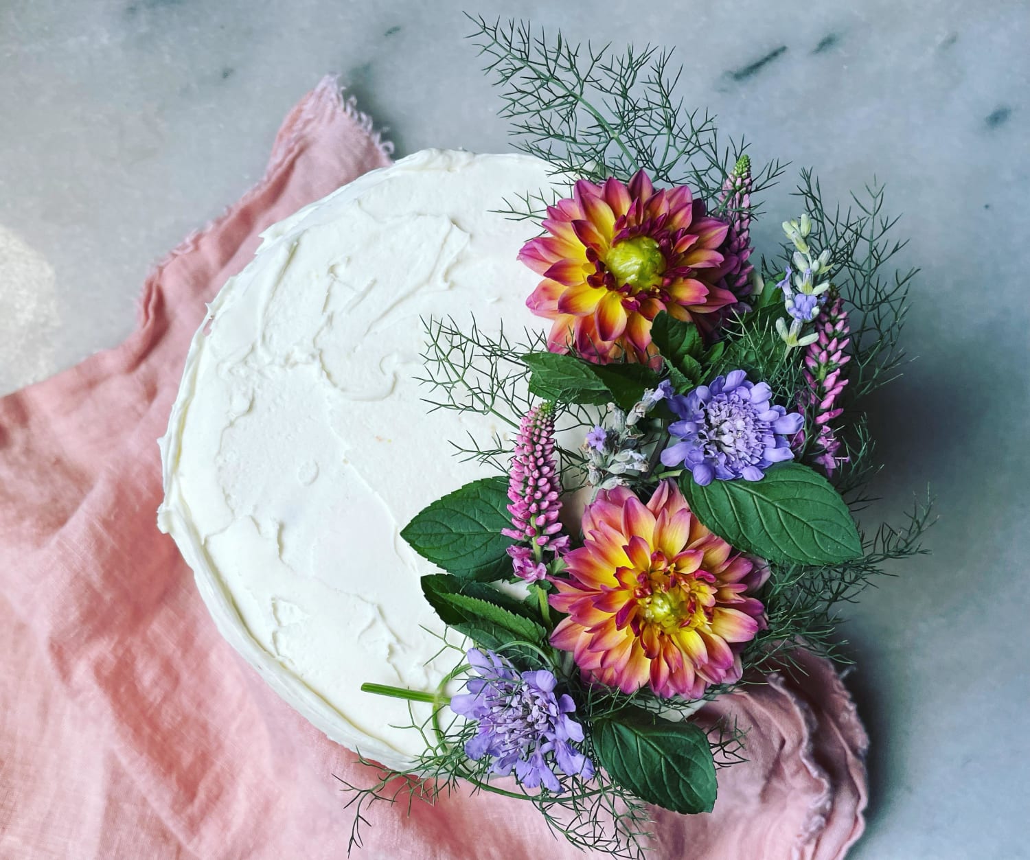 Sprinkles cake w/lemon curd & marshmallow icing, all homemade. Dahlias, fennel, chocolate mint, scabiosa, lavender, & veronica from my garden