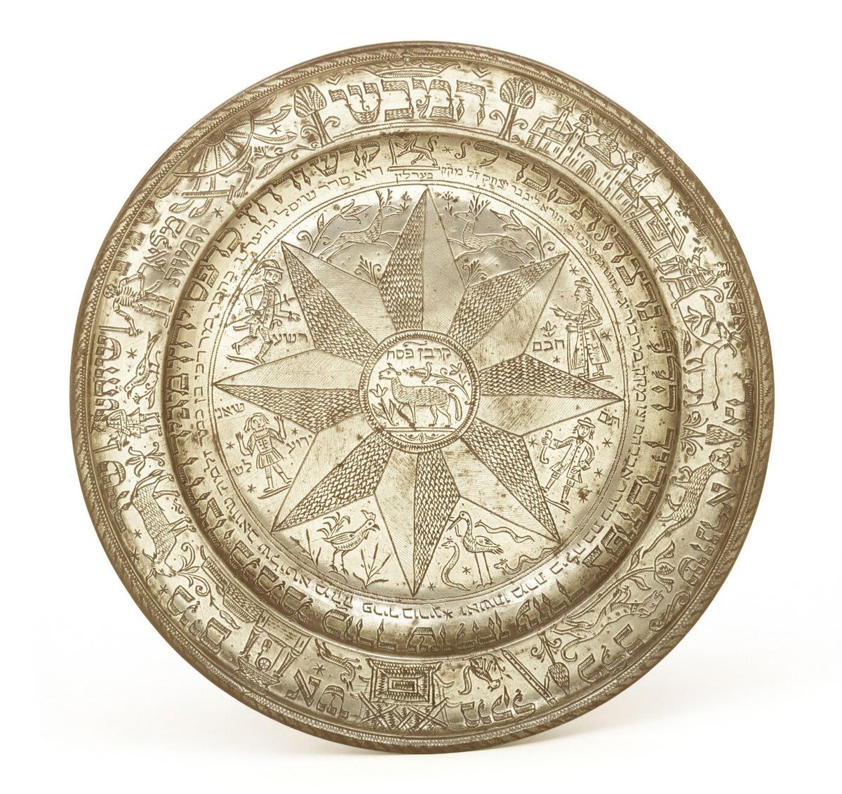 Happy Passover! This Seder plate, traditionally used on the first two nights of Passover, was designed to hold the six symbolic foods eaten during the Passover meal.
