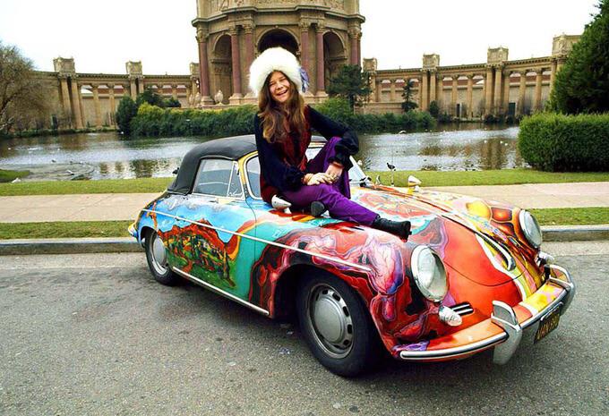 Singer-songwriter and Anti-materialist Janis Joplin posing with her Porsche 356 SC with psychedelic paint job.