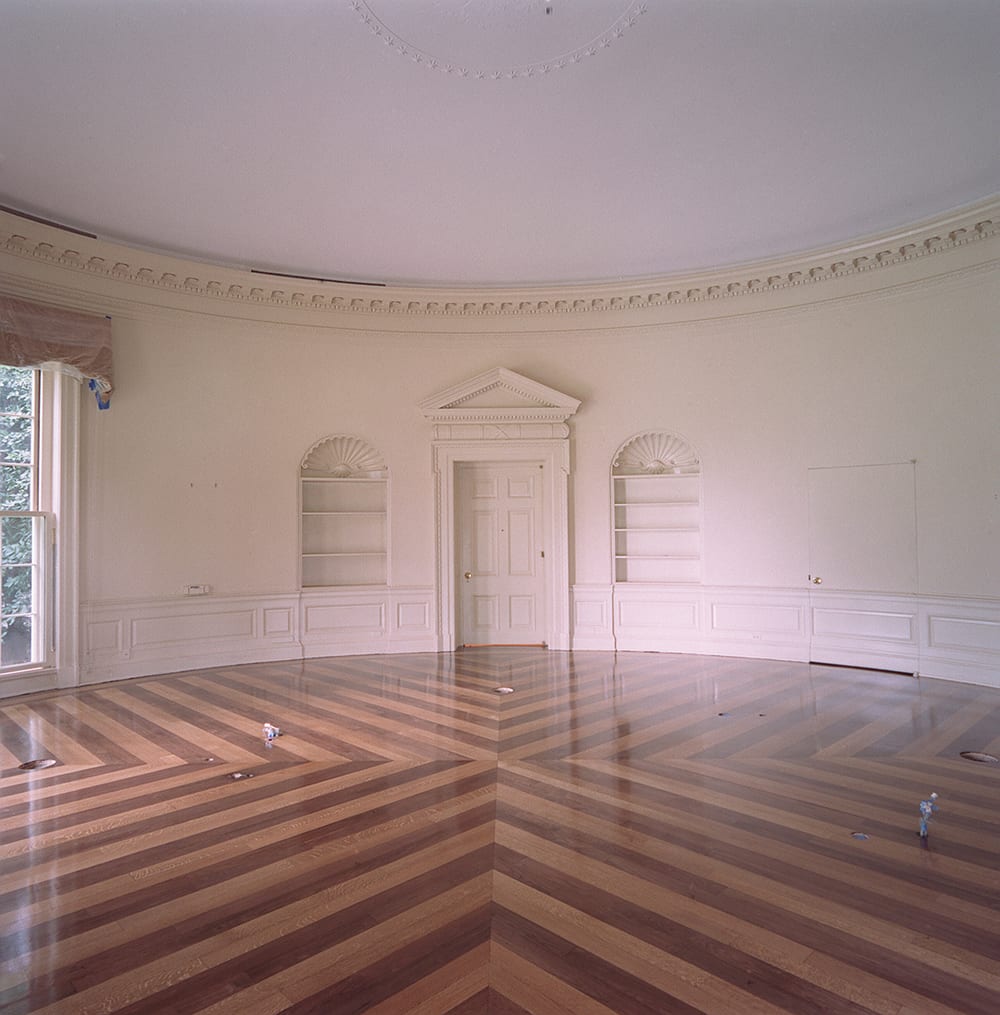 It's not the usual view of the Oval Office, but this photo of an empty room was captured during renovations in August 2001. The alternating pattern of the wood floor is made from walnut and quartered white oak. WhiteHouseWednesdays