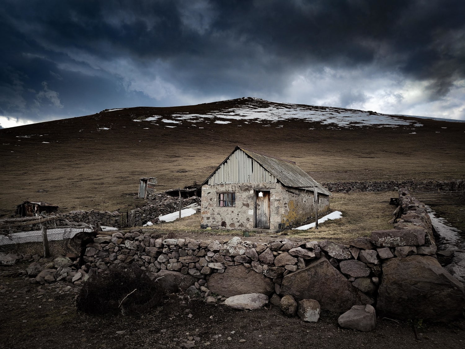 Abandoned during winter time, house of shepherd at mountains, Armenia, Lori province.