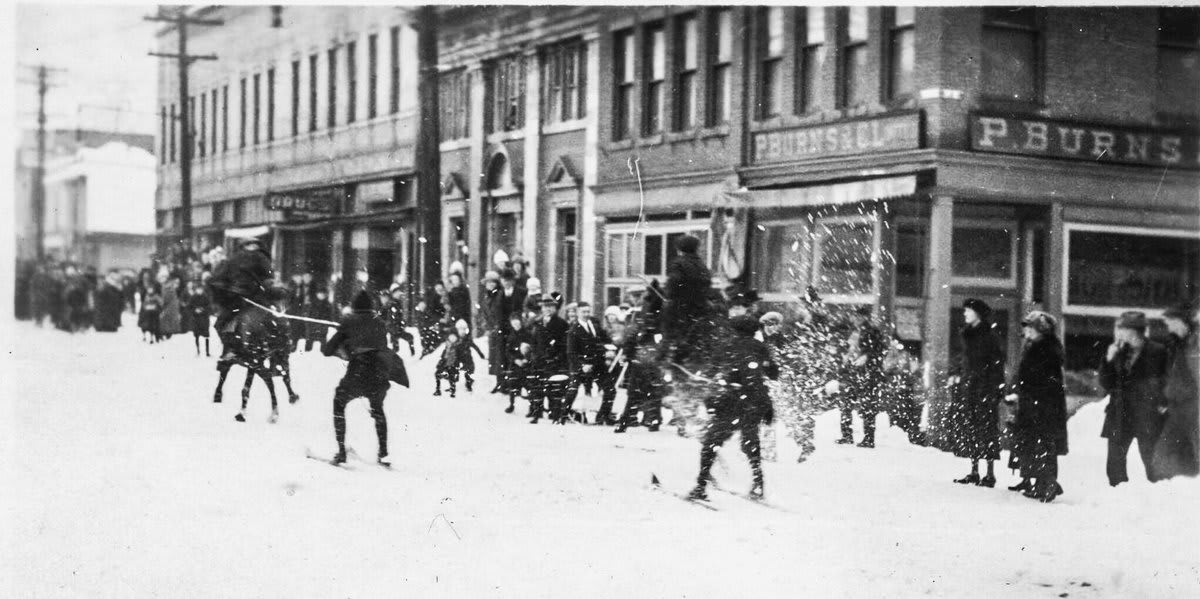 Children enjoy a snowball fight in the streets of Revelstoke, British Columbia.