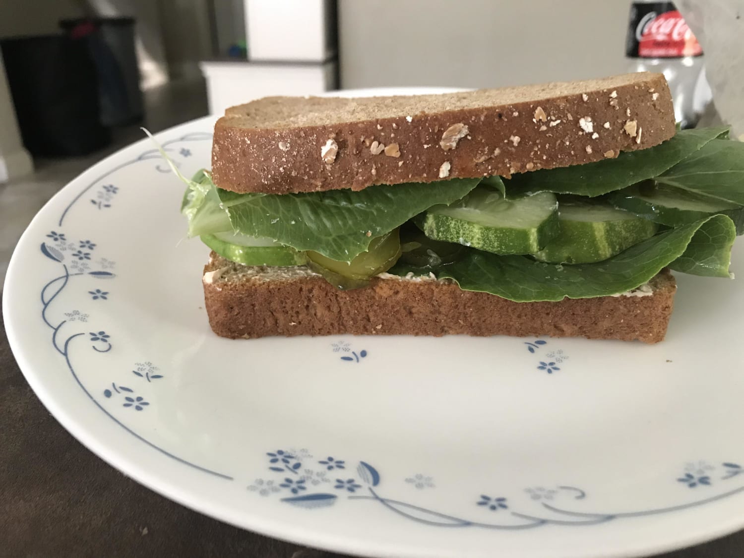 Homegrown cucumber and romaine lettuce with homemade bread and butter pickles and sriracha cream cheese spread on wheat bread. Doesn’t look like much but tis divine my friends.
