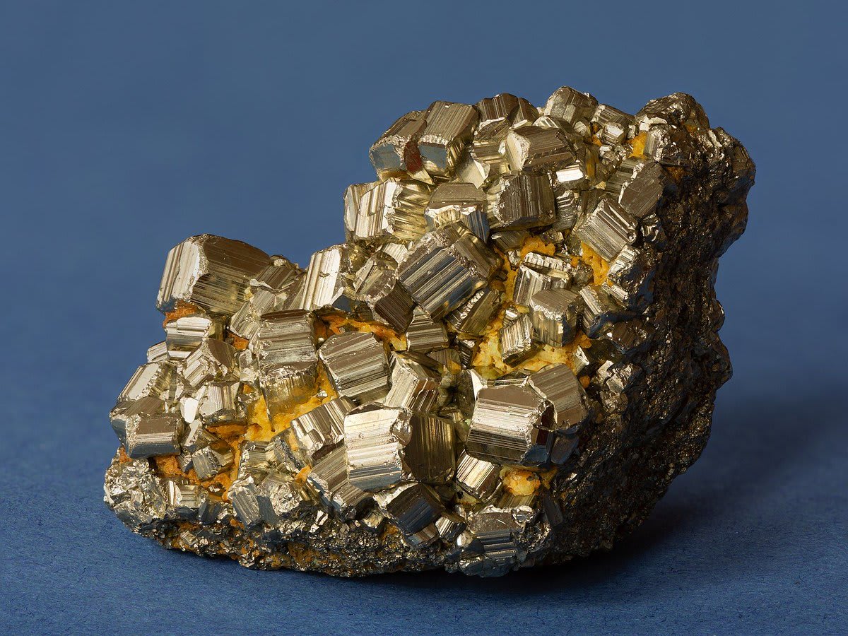 Turns out "fool's gold' actually has a type of newly discovered real gold within it! Who's the fool now?  Pyrite, composed of iron disulfide (FeS2) can contain sneaky bits of gold hidden within imperfections of its crystal structure.  Uoaei1/Wikimedia Commons