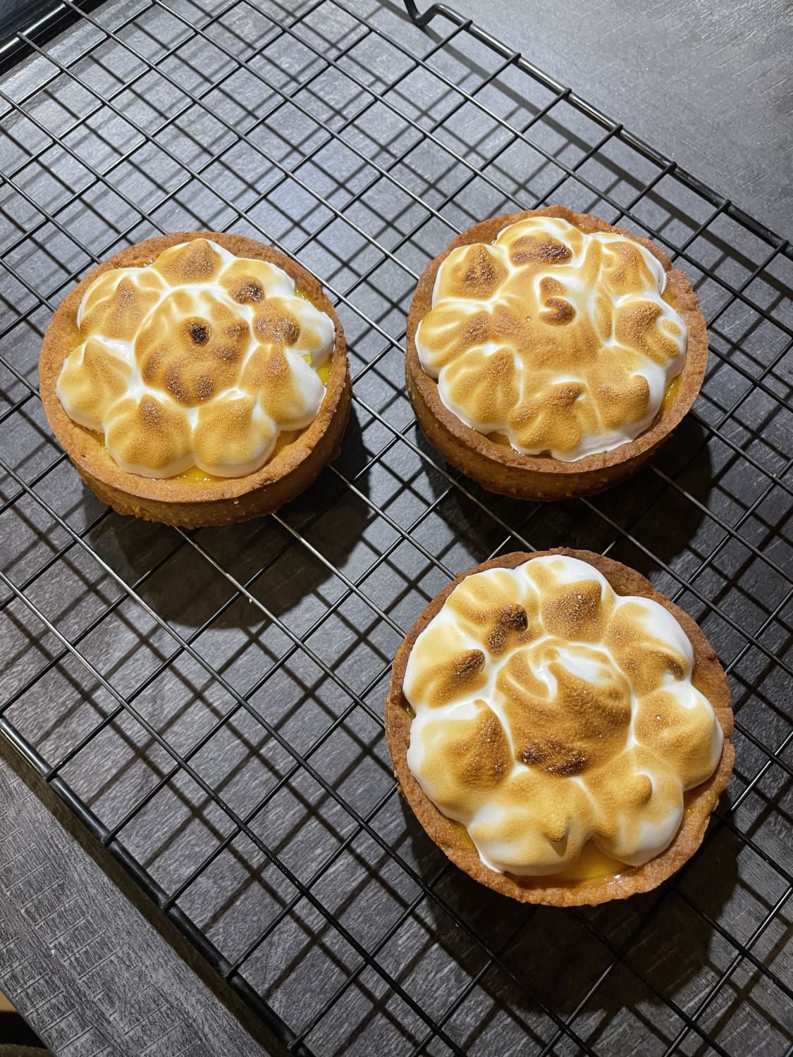 I want to go to pastry school so I am trying to learn the basics at home. I've never done anything like this before: mini tarts with lemon curd and Italian meringue