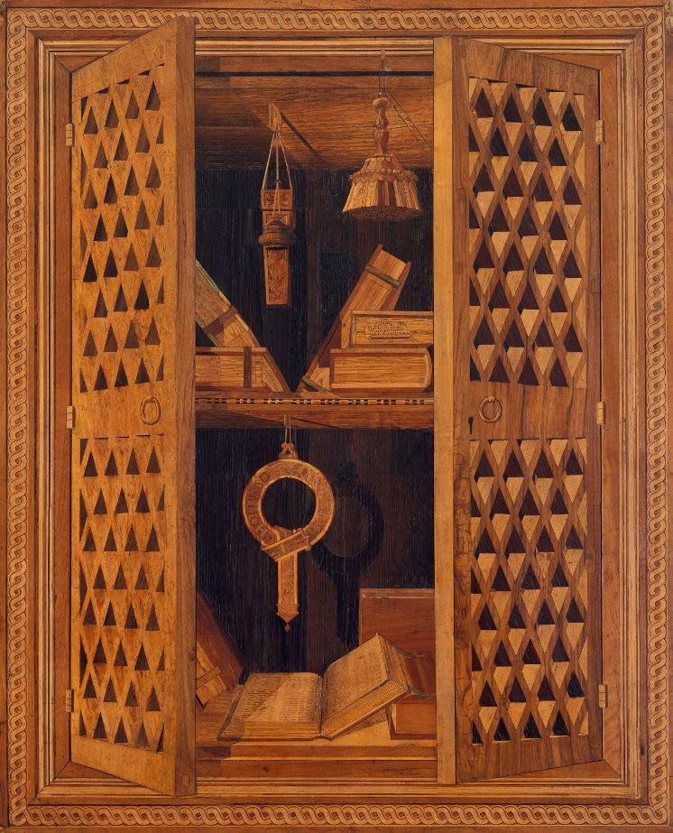 This is not a painting. It is made entirely of wood, its surface flat. A detail from the 15th-century "Studiolo Gubbio", one of the finest examples of intarsia, the masterful art of fitting together pieces of wood to make images: