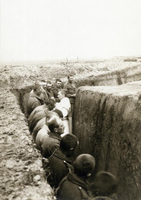 Austro-Hungarian soldiers receive absolution in a trench on the Eastern Front, 1915-WWI