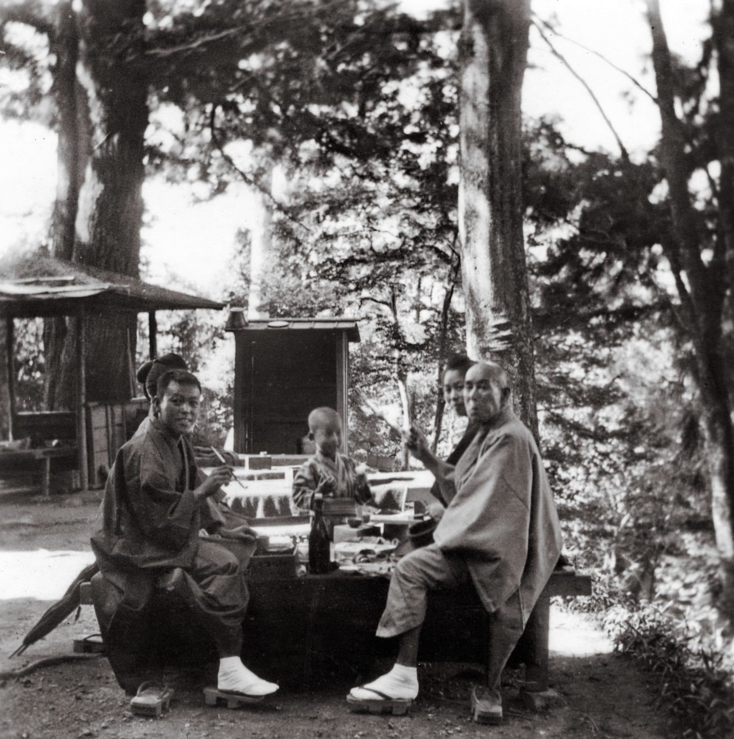 Japanese family enjoying a picnic at the Ise Shima National Park, near Osaka. Japan, 1922.