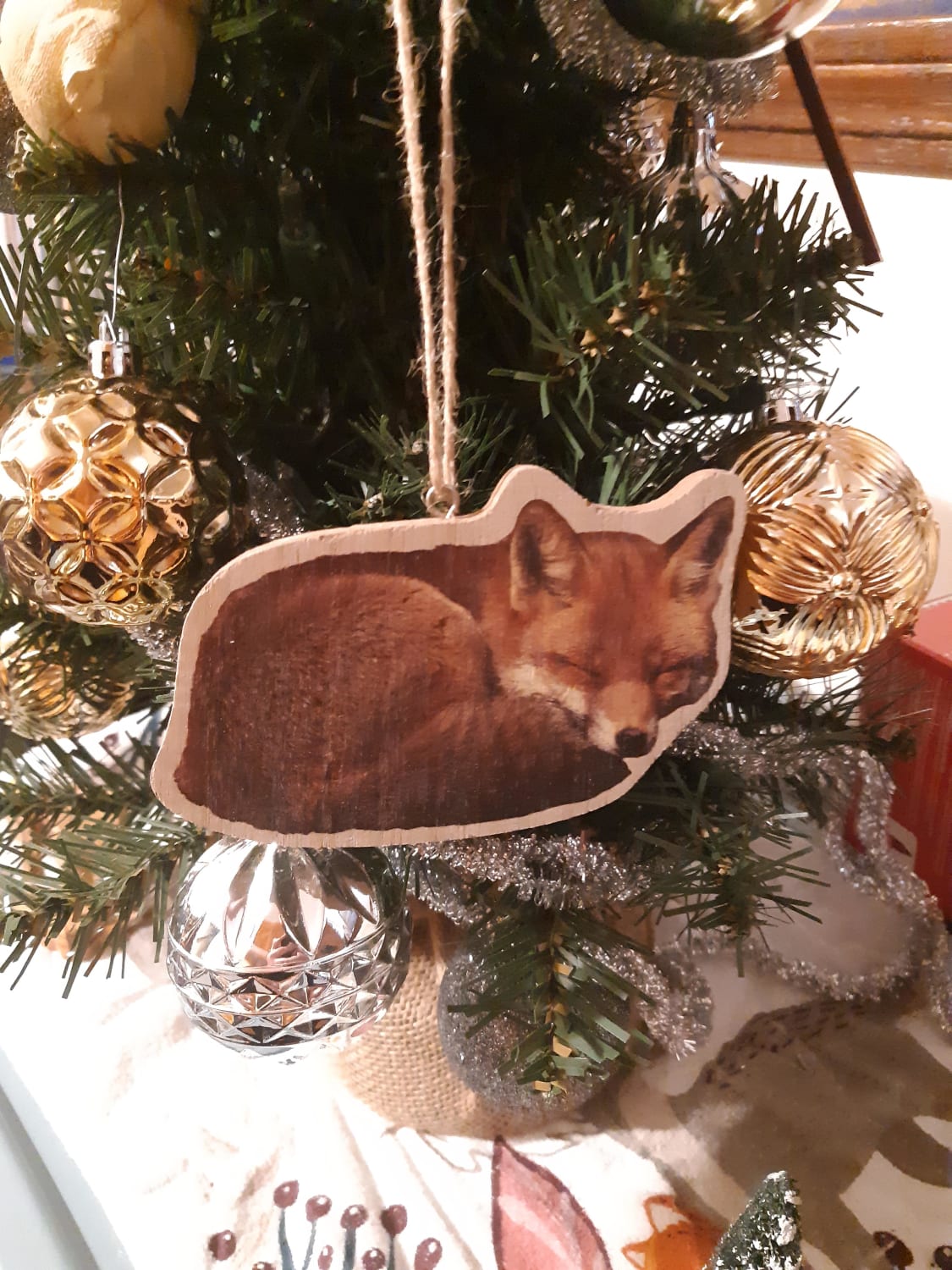Just wanted to share the ornament I got for Christmas