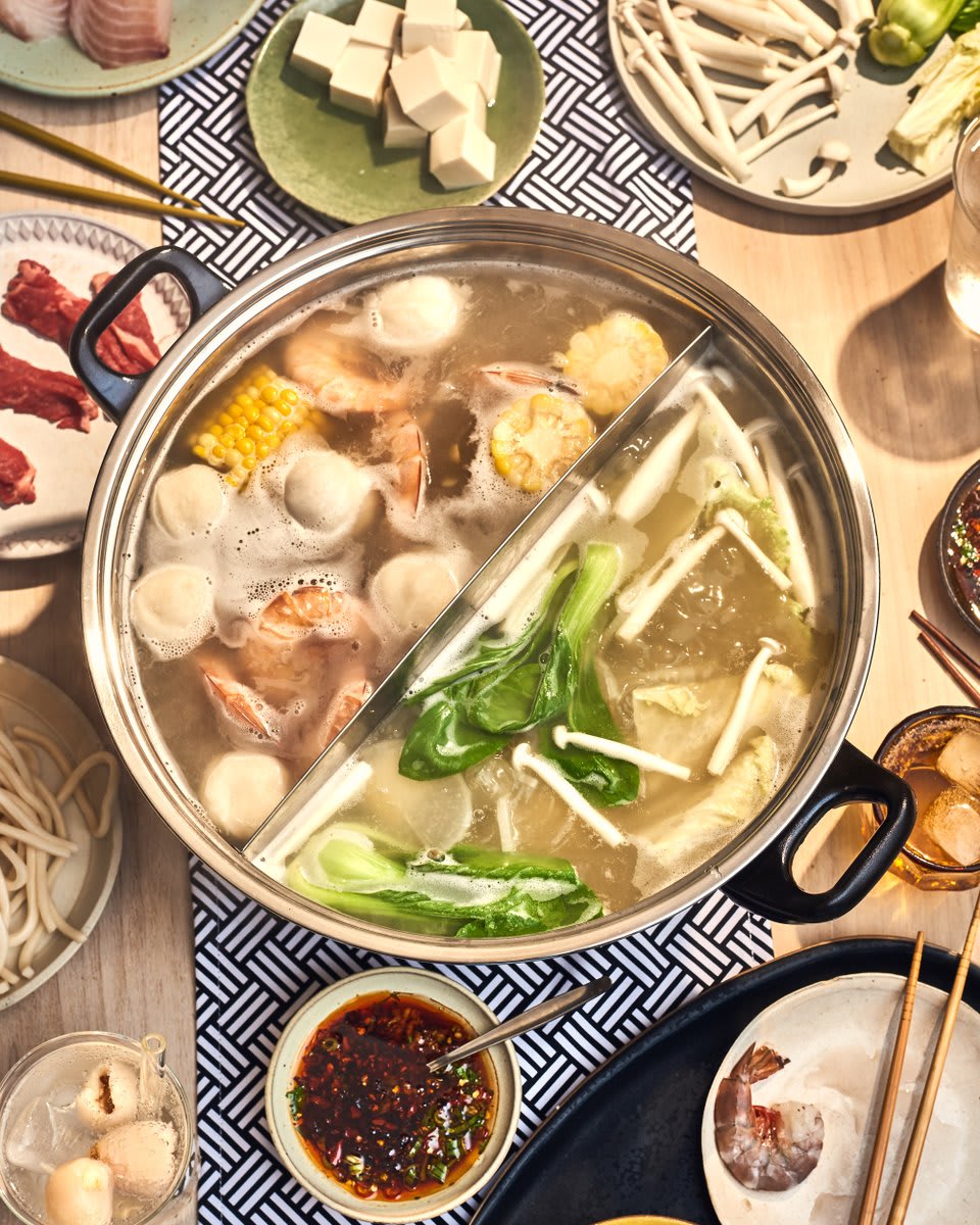 @CupofTJ's homemade pork bone broth is the star of this hot pot feast: