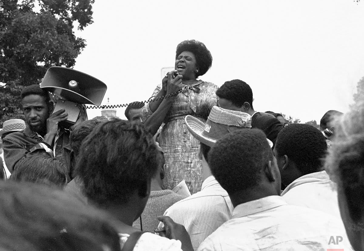 Fannie Lou Hamer, of Ruleville, Miss., speaks to Mississippi Freedom Democratic Party sympathizers outside the Capitol in Washington after the House of Representatives rejected a challenger to the 1964 election of five Mississippi representatives, OTD in 1965.