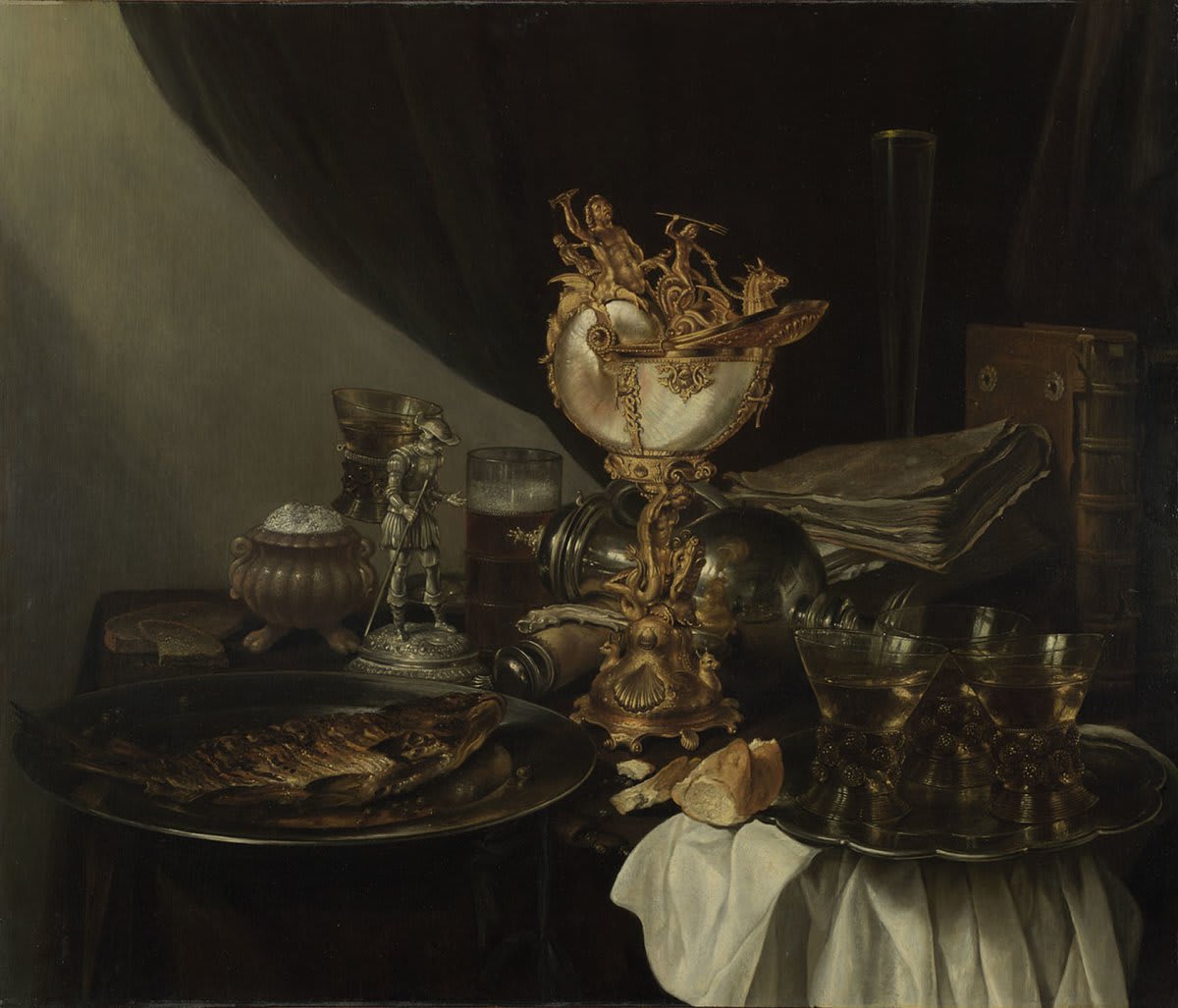 This gloriously cluttered picture suggests the aftermath of a rich banquet that’s gone a little too far. In the centre stands a nautilus cup and it's meant to impress. It’s made from a real nautilus shell, at the time a rare and costly item: