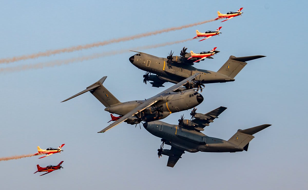 The crazy perspective in this photo. -- A-400M transport planes fly during a rehearsal ahead of the Langkawi International Maritime and Aerospace Exhibition 2019 on March 23, 2019, in Langkawi, Malaysia. (Liu Jun / VCG via Getty)