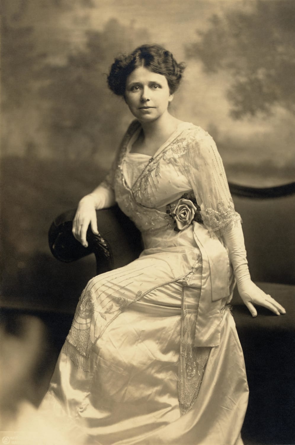 Hattie Caraway, later first female member of United States Senate (from Arkansas). Full-length studio portrait, sitting, facing front.