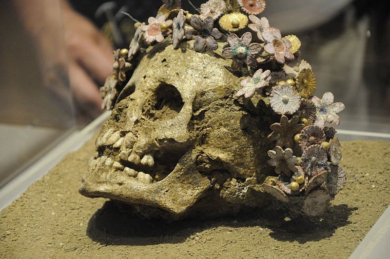 Girl buried with a crown of ceramic flowers. Patras, 300-400 B.C.
