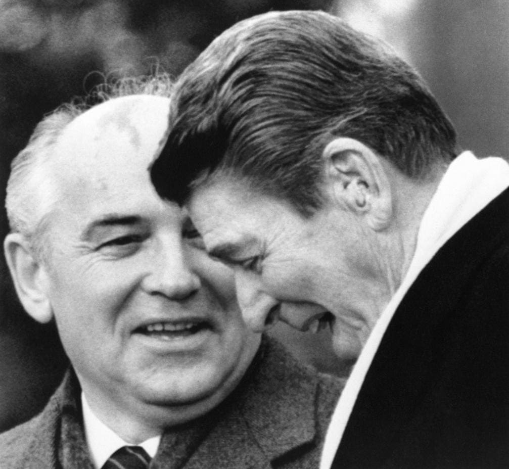 Mikhail Gorbachev meets President Reagan during his four-day visit to the US in December 1987 ]
