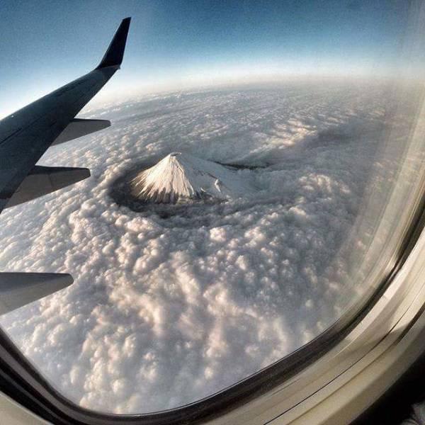 Mt. Fuji piercing through the clouds