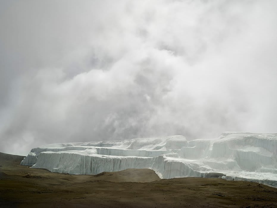 Denying climatechange won't make the problem go away. parisagreement 📸Ian van Coller, "Kilimanjaro: The Last Glacier," via