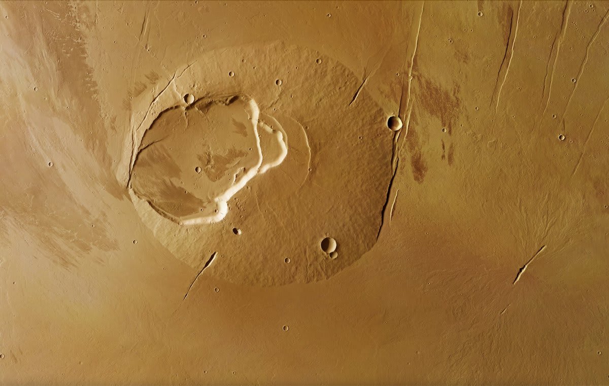 This image of the Jovis Tholus shield volcano on Mars was taken by ESA's MarsExpress on 13 May and 2 June 2021. The volcano’s complex caldera system comprises at least five craters, the largest being 28 km wide