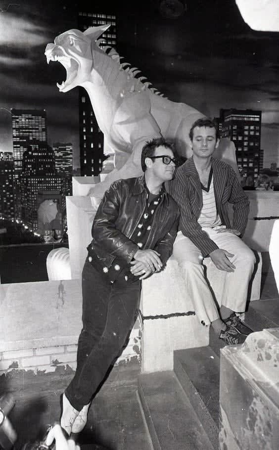 Dan Aykroyd, Bill Murray and Vinz Clortho on the set Ghostbusters in 1984. Digging on Dan's glasses.