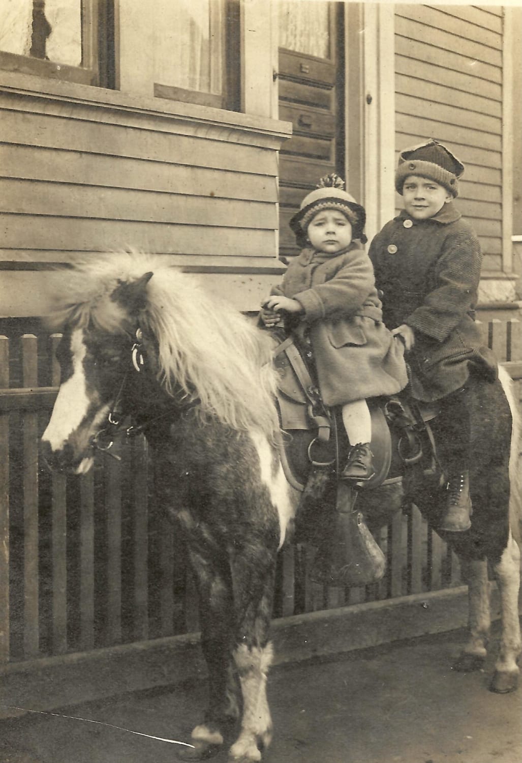 My grandfather and his brother on a pony outside their home in Providence, RI., 1924