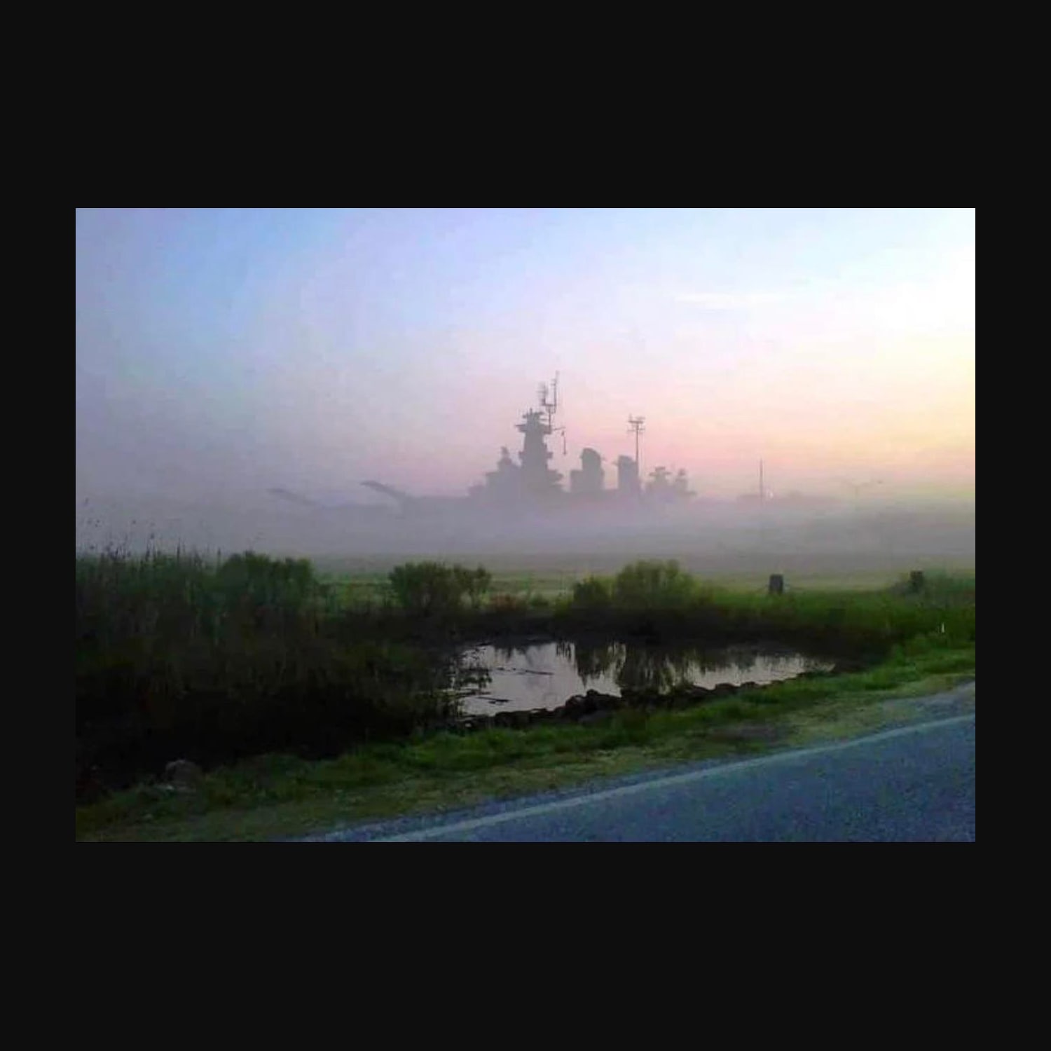 USS North Carolina in the fog
