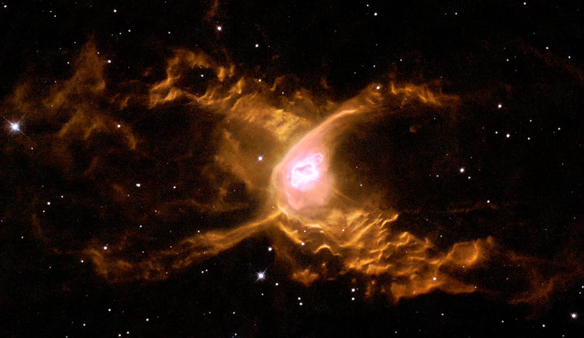 Day 11 of the 2017 Hubble Space Telescope Advent Calendar: The Red Spider Nebula. Huge waves are sculpted in this two-lobed nebula some 3,000 light-years away in the constellation of Sagittarius.