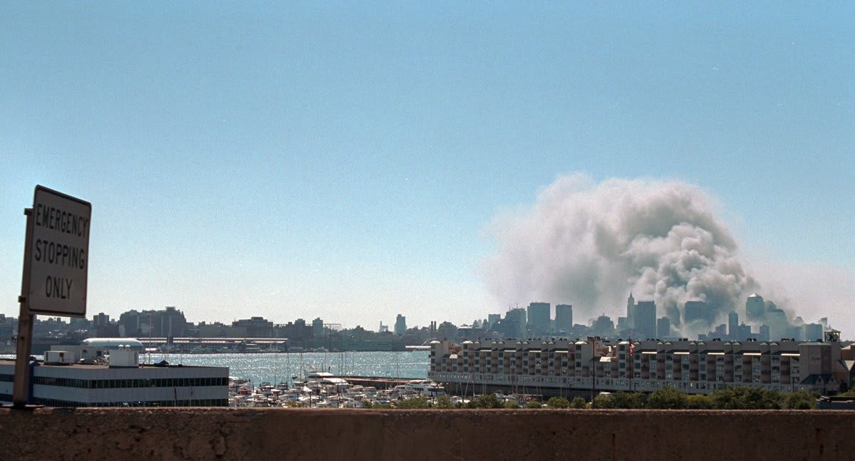 “Smoke rises from the site of the World Trade Center.” 17 years ago