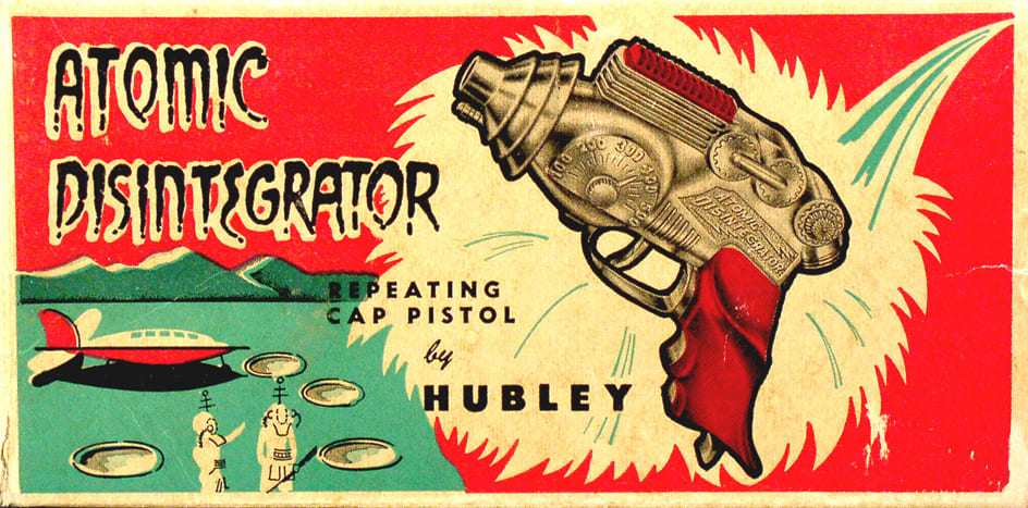 Box art for the Atomic Disintegrator Repeating Cap Pistol by Hubley, 1954