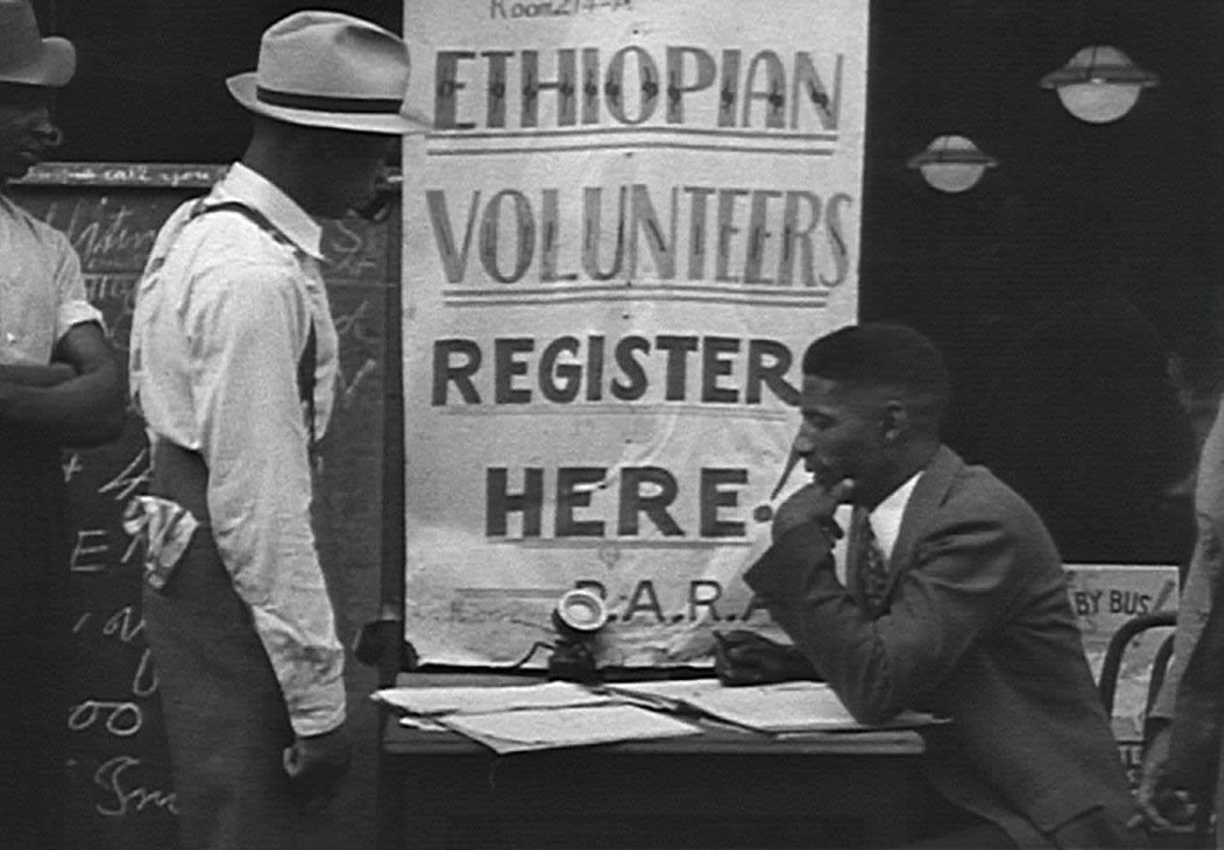 African Americans lined up to volunteer in the Ethiopian military. New York City, 1935