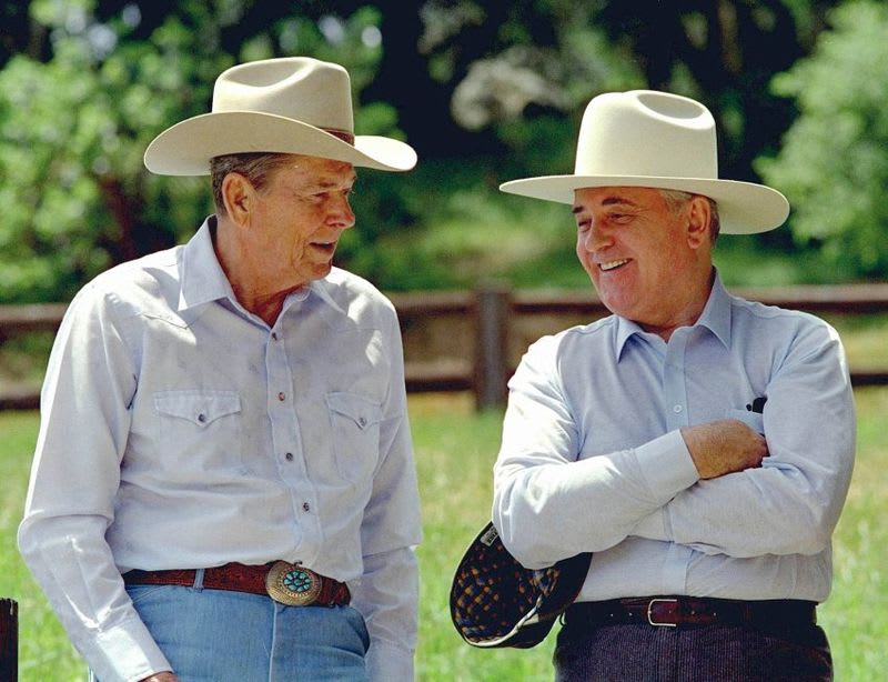 one of my favorite photos is the public domain: Ronald Reagan and Mikhail Gorbachev relax at Reagan's California Ranch. President Reagan gave this cowboy hat to Mikhail Gorbachev, which he promptly put on backwards. 1992