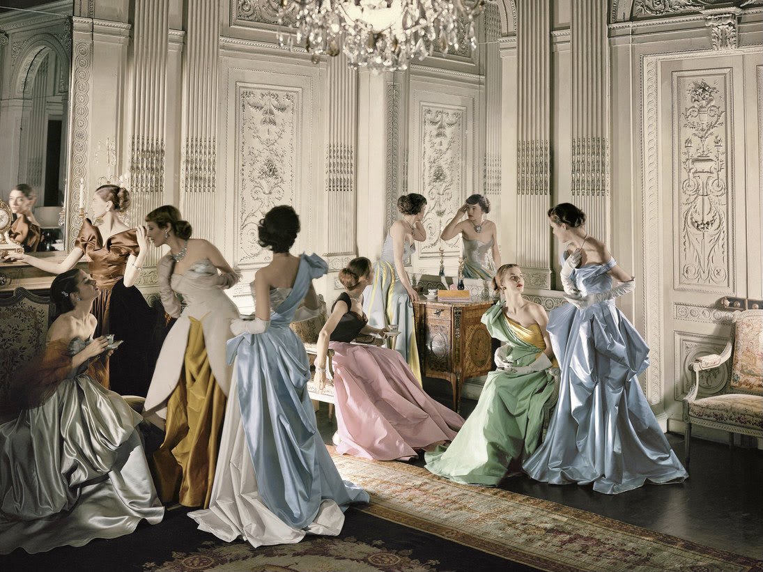 An iconic image for good reason. Charles James gowns photographed by Cecil Beaton for Vogue, June 1948. Models include Marilyn Ambrose, Dorry Adkins, Carmen Dell'Orefice, Andrea Johnson, Lily Carlson, & Dorian Leigh. They stand in French & Company's 18th Century paneled room.