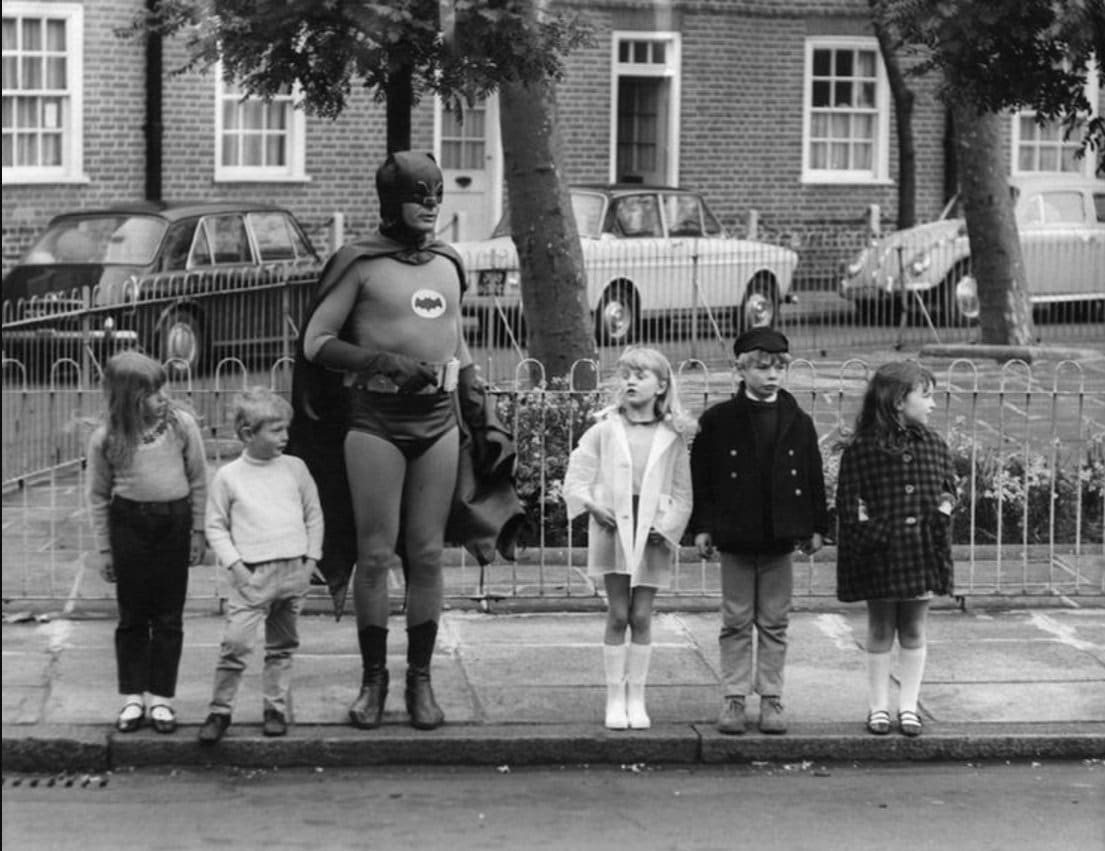 Batman teaching children how to cross the road. London, 1967.