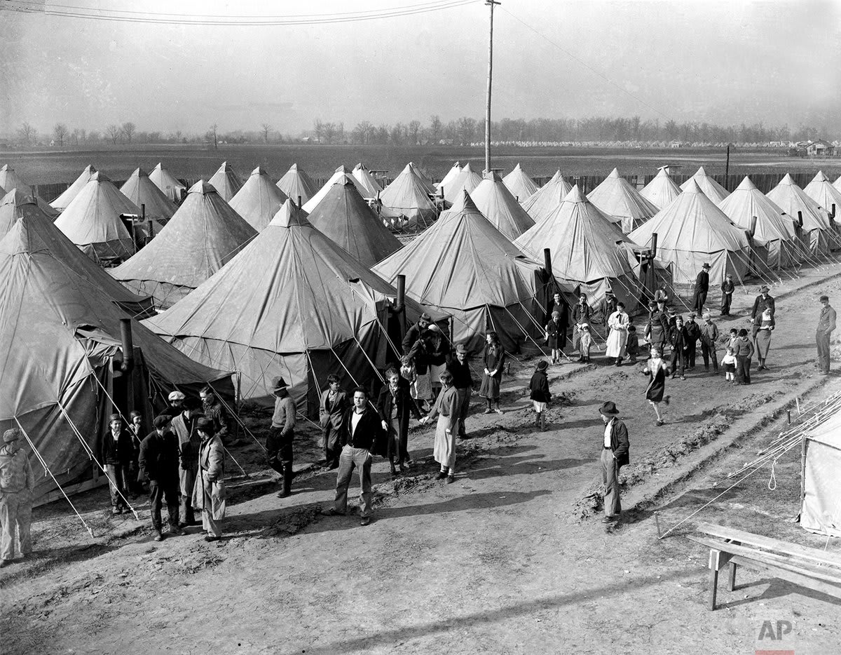 Tents are set up in rows to house hundreds of refugees forced from their lowland homes by heavy floods at Walnut Corners, Ark., OTD in 1937. It was the heaviest floods recorded in this section of the Mississippi River Valley.