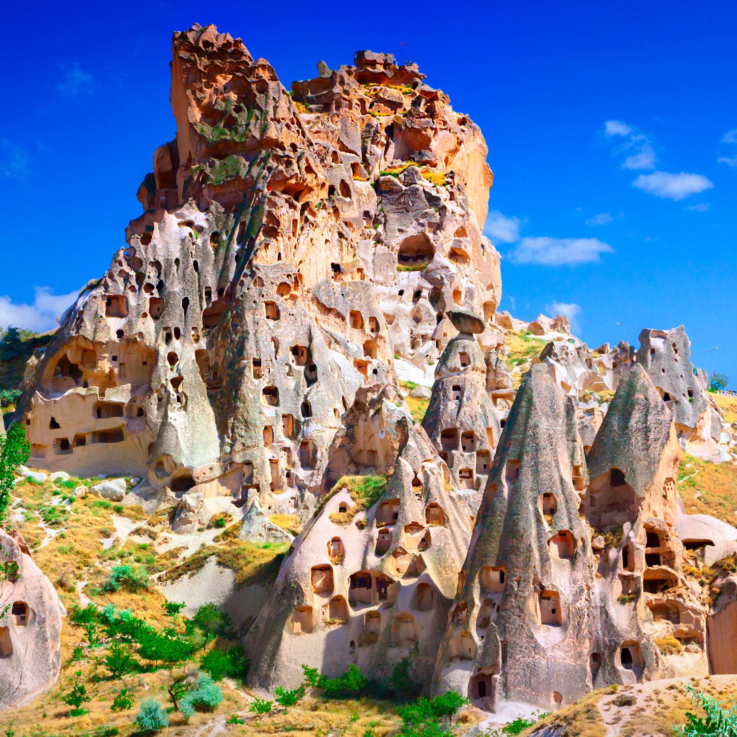 The 60-metre-high Uçhisar castle-mountain is crisscrossed by many underground passageways and rooms which served as residential areas as well as cloisters in Byzantine times. Originally around 1000 people lived in the castle, but it is no longer inhabited today. Nevşehir Province, Turkey