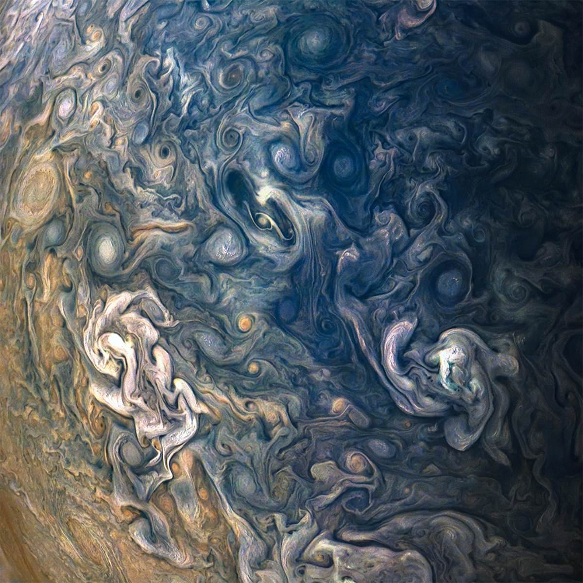 NASA's $1 billion Jupiter probe has taken mind-bending new photos of the Gas Giant.