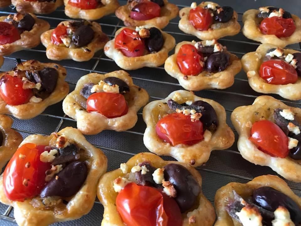 I made little bite-size antipasto tarts - feta, olives, anchovy, tomato on top of herby caramelised onions and puff pastry.
