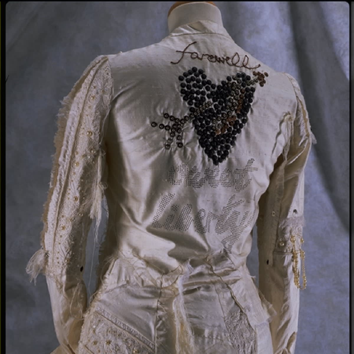 Think punk, but also wedding chic Liberty commissioned Joe Casely-Hayford to create a garment for their display of wedding dresses by British designers in 1992. Using traditional materials but with fraying, patchwork, and metal rivets, he makes it entirely unconventional