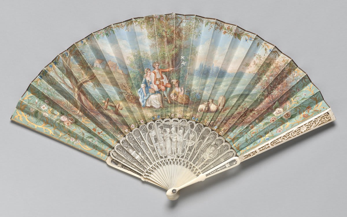 FanFriday Can you spot the painted on to this English fan? Wedding-themed designs were traditionally gifted to brides before their big day.