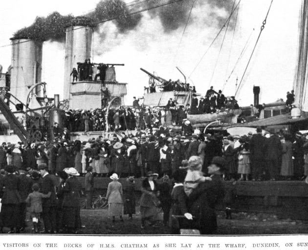 Visitors crowd around to tour the HMS Chatham on Dunedin Wharf, New Zealand. The officers on the vessel were unable to cope with the crowds, and eventually the gangways were blocked to prevent the public from boarding until the vessel was cleared of those who thronged the decks.