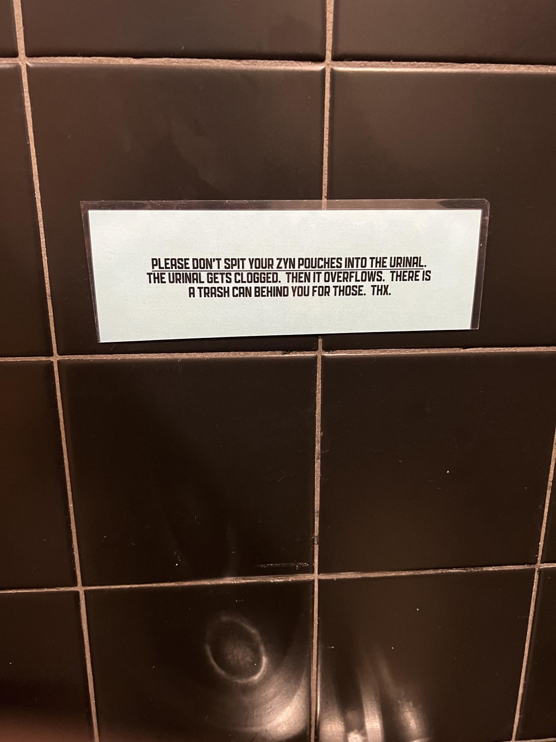 At the urinal in a brewery