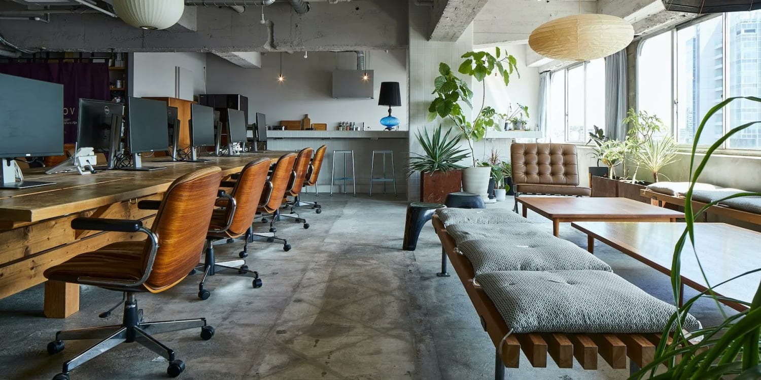 architecture firm ROOVICE reveals its new office space in japan, blending modern design and mid-century accents within a light-filled, renovated interior.