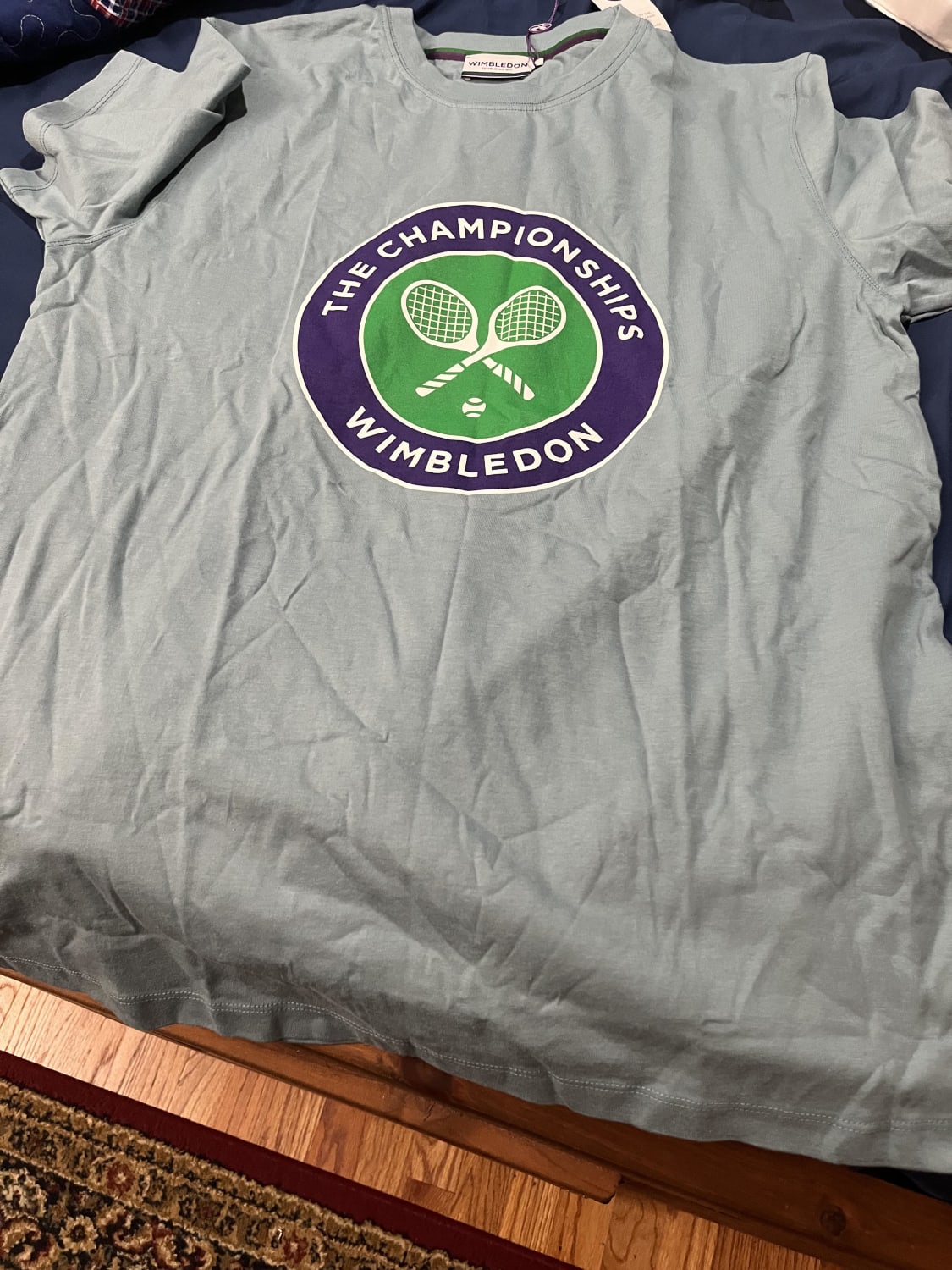My parents recently went to London and took a tour of the Wimbledon stadium. They got me this shirt. Really hope to go to Wimbledon one day.