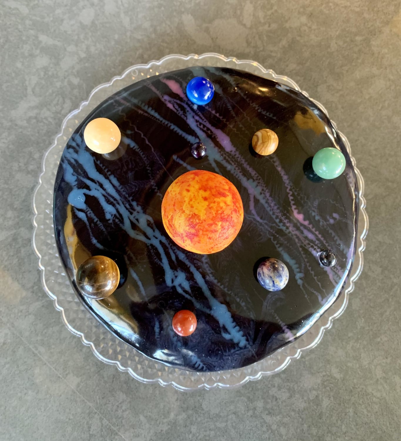 I’m usually terrible at decorating cakes, but I’m a little proud of my son’s solar system birthday cake.