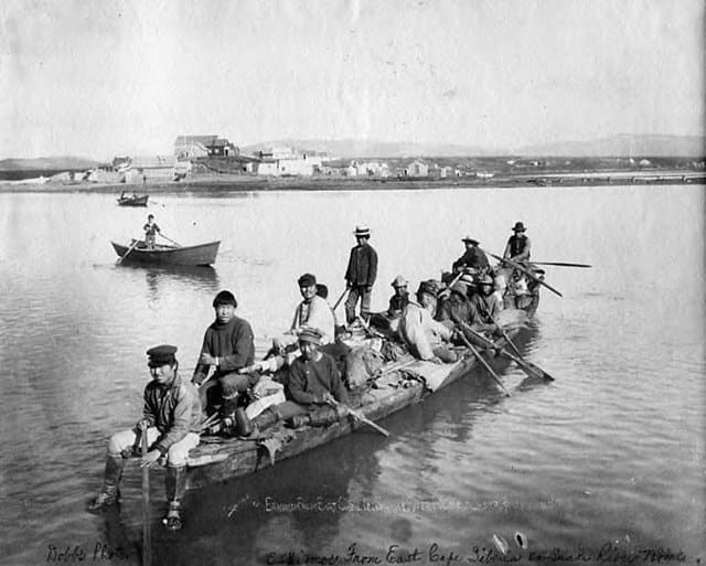 Eskimos from East Cape, Siberia in boat on the Snake River, Nome, Alaska, between 1898 and 1908