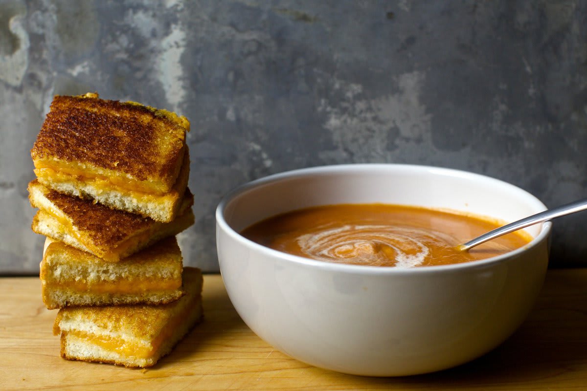 If this isn't grilled cheese and tomato soup weather, I don't know what is. This is a classic version, reminiscent the stuff of iconic Warhol prints, but with a depth and complexity that makes it dreamy. Plus, mandatory, unfussy grilled cheese sandwiches.